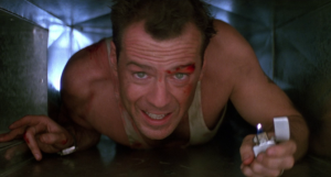 Bruce willis as John McClane in 'Die Hard'